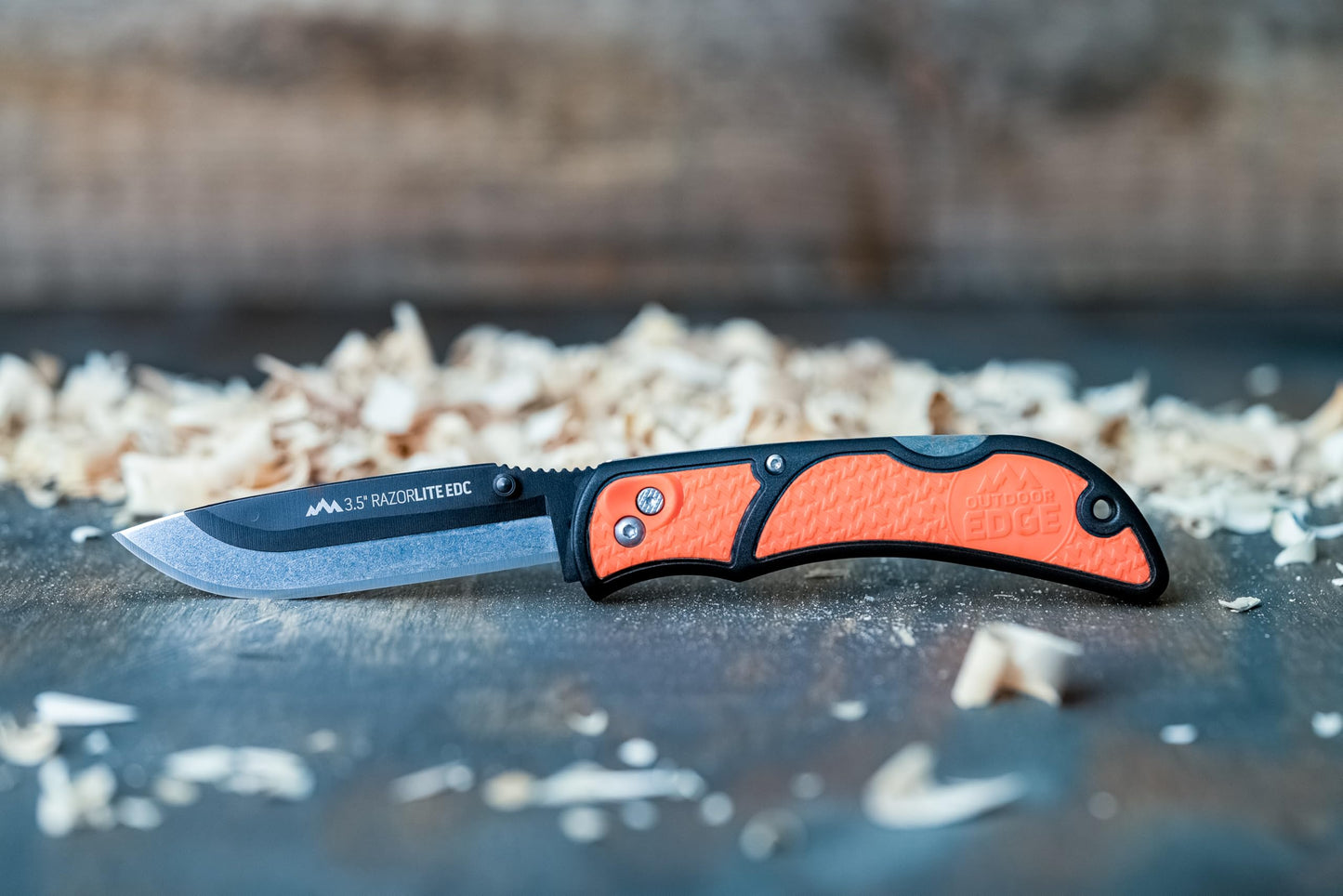 OUTDOOR EDGE 3.5" RazorLite EDC Knife. Pocket Knife with Replaceable Blades and Clip. The Perfect Hunting Blade for Skinning Deer. Blaze Orange with 6 Blades